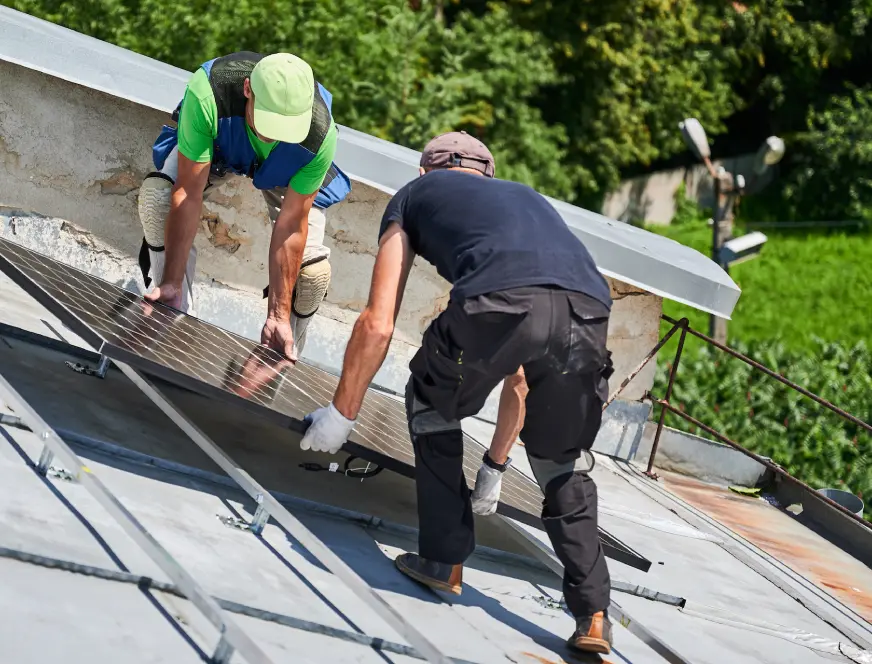 workers-building-solar-panel-system-on-roof-of-hou-2024-01-24-17-44-49-utc-2.webp